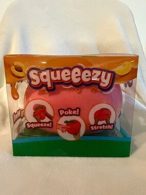 NIB Squeeezy Peach Fruit Stress Toy